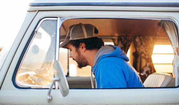 Michael in the driver's seat of 'Rocky' the VW campervan.