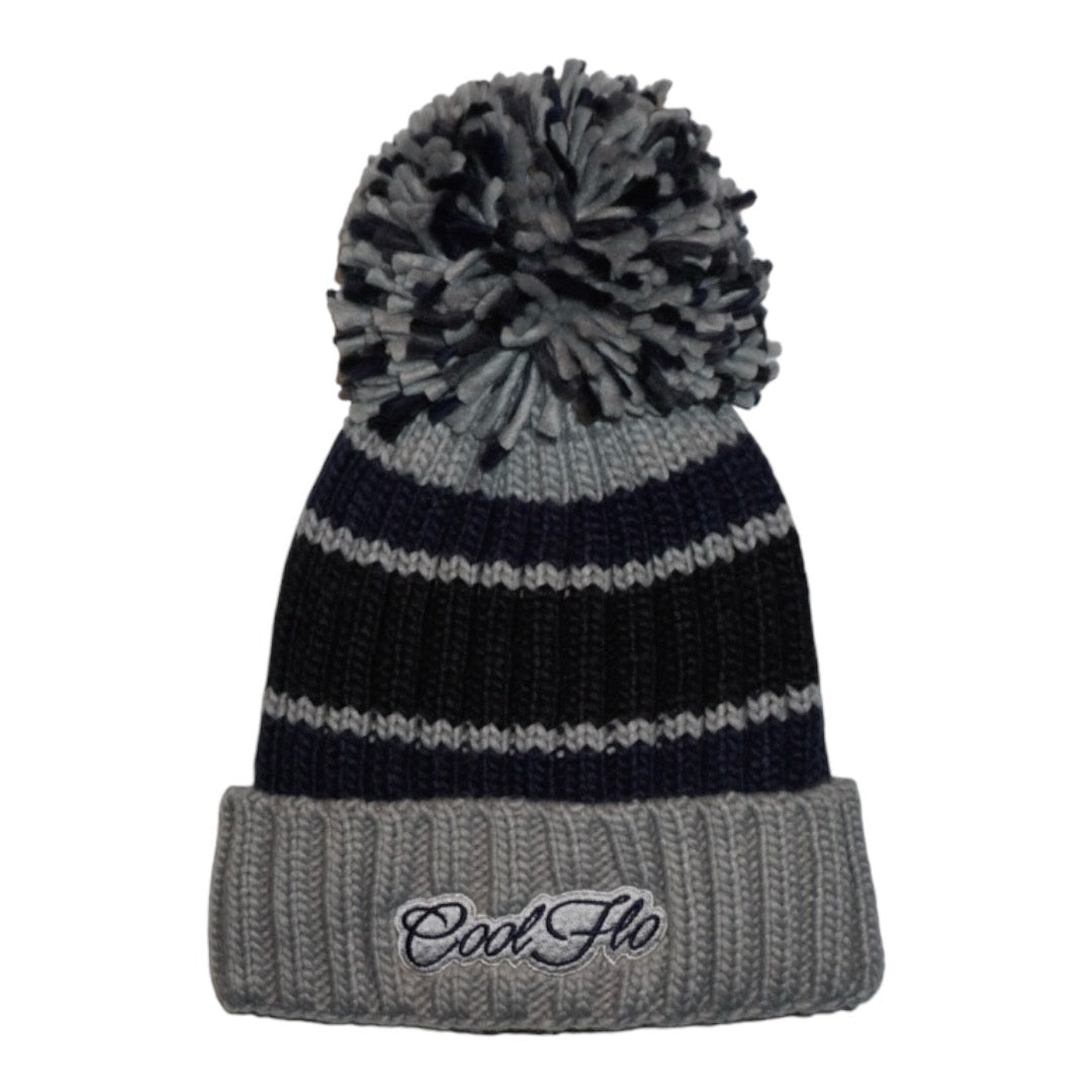 Chunky-knit bobble hat with script logo and large pom pom. Navy blue and grey.
