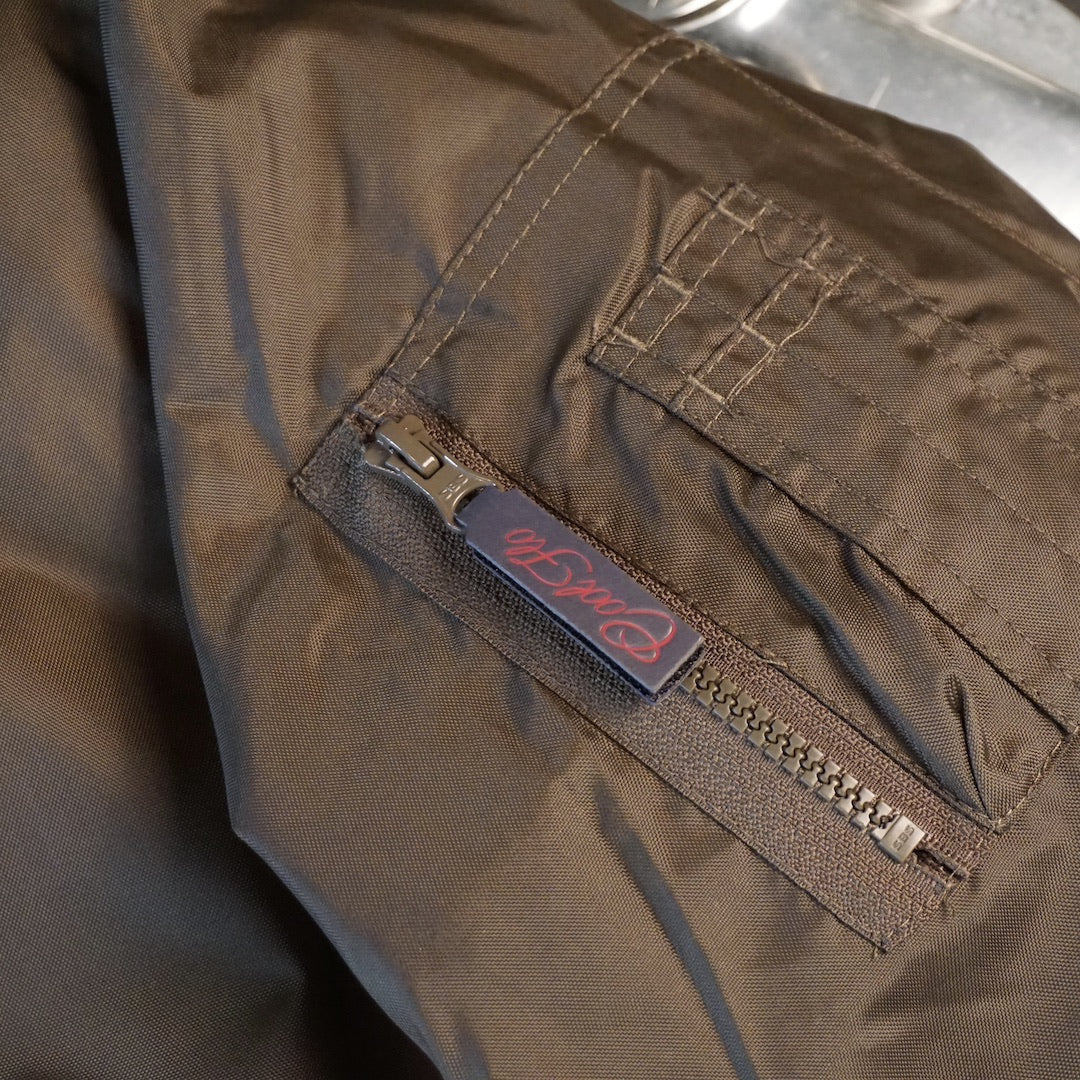 Cool Flo Collared Green Bomber Jacket - arm zip close-up