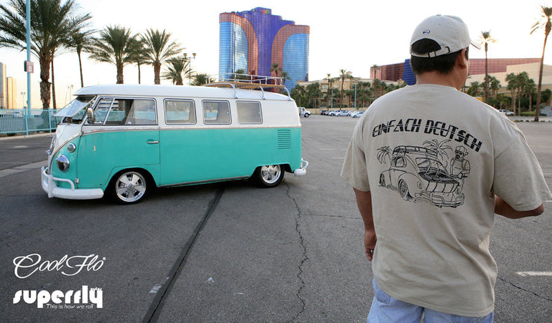 Member of the Einfach Deutsch VW Club with vintage split-screen VW camper in Las Vegas