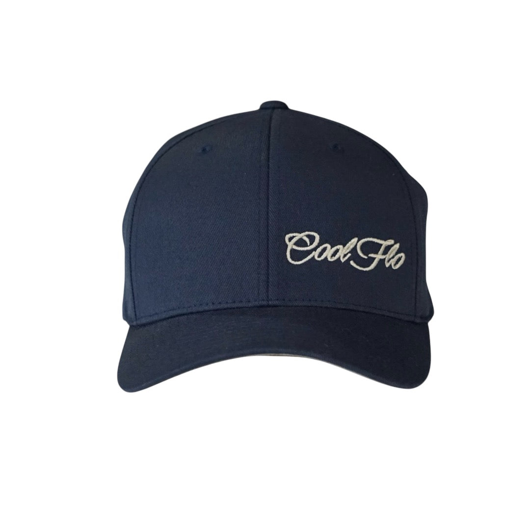 Navy blue flex-fit baseball cap with light grey script logo embroidered on the side.