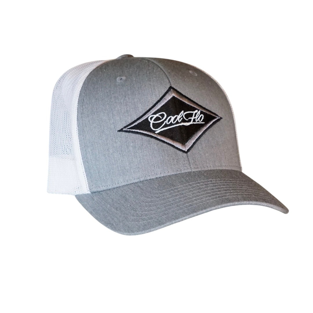 Grey and white trucker cap with an embroidered Cool Flo logo in a diamond design.