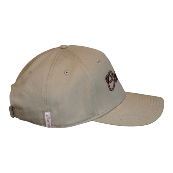 A khaki baseball cap with 'Cool Flo' embroidered in brown script across the front and a red on white Cool Flo loop tag on the side - side view.