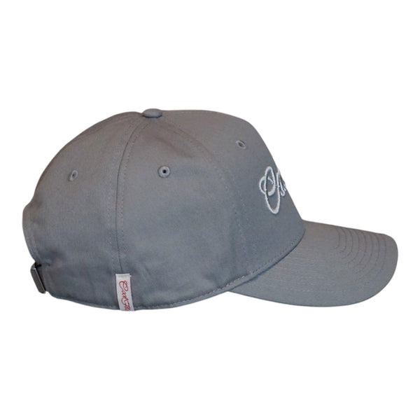 A grey baseball cap with 'Cool Flo' embroidered in silver script across the front and a red on white Cool Flo loop tag on the side - side view.