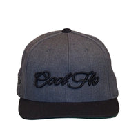 Front view of a Cool Flo snapback cap in Dark Grey featuring a raised 3D Black embroidered Script logo and flat visor