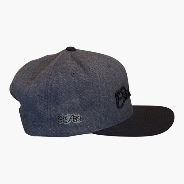 Right side view of a Cool Flo Dark Grey/Black snapback cap featuring CF89 embroidered side detail, structured six-panel construction and adjustable snapback fastening