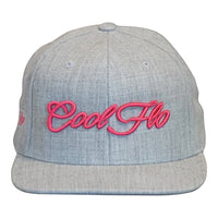 Front view of a Cool Flo Heather Grey snapback cap featuring a raised 3D Pink embroidered Script logo and flat visor