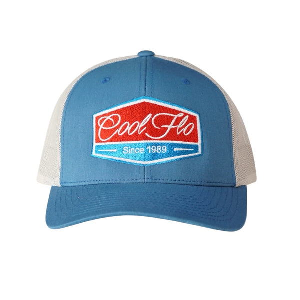 Cool Flo Blue and silver-grey two-tone trucker caps with turquoise, red and white embroidered badge design on the front.Cool Flo - Since 1989