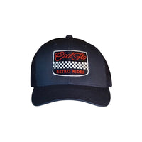 Cool Flo Retro Rides Navy trucker cap with embroidered chequered badge design in white, red and navy.