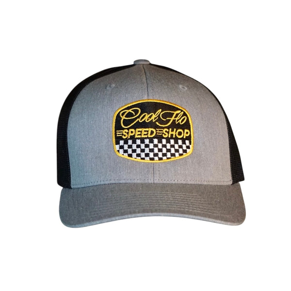 Cool Flo grey and black trucker cap with  logo and Speed Shop chequered design in yellow, black and white embroidery.