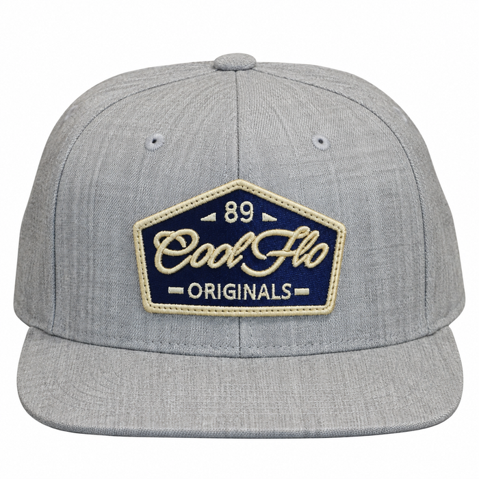 Front view of a Cool Flo 89 Originals snapback cap in Heather Grey featuring an embroidered 89 Originals badge in Navy, Gold and White and a flat visor.