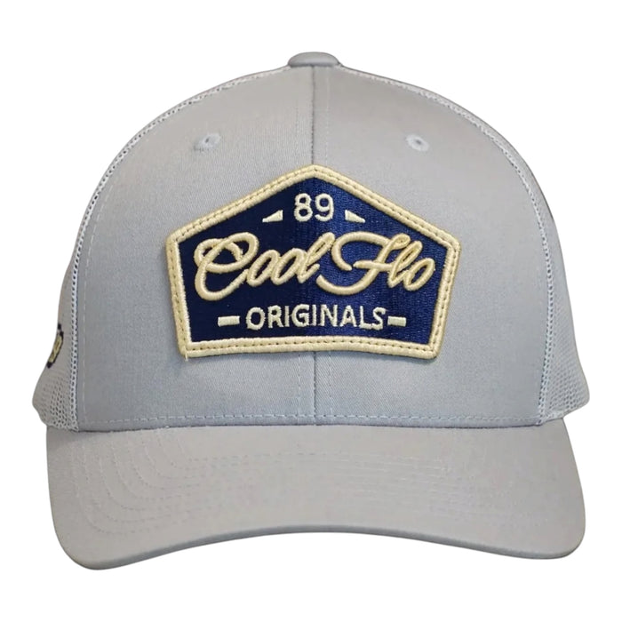 Front view of a Cool Flo 89 Originals trucker cap in Silver featuring an embroidered 89 Originals badge in Navy, Gold and White and a curved visor