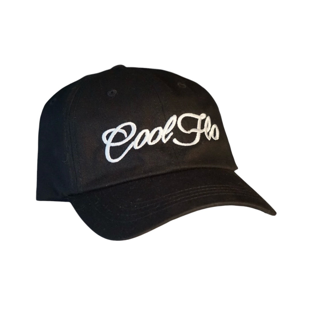 Black dad cap with white script logo embroidered on the front. 