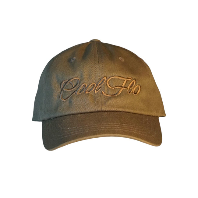 Green dad cap with matching embroidered script logo on the front.