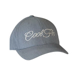 Heather grey baseball cap with a 12cm light grey script logo embroidered on the front of the cap.