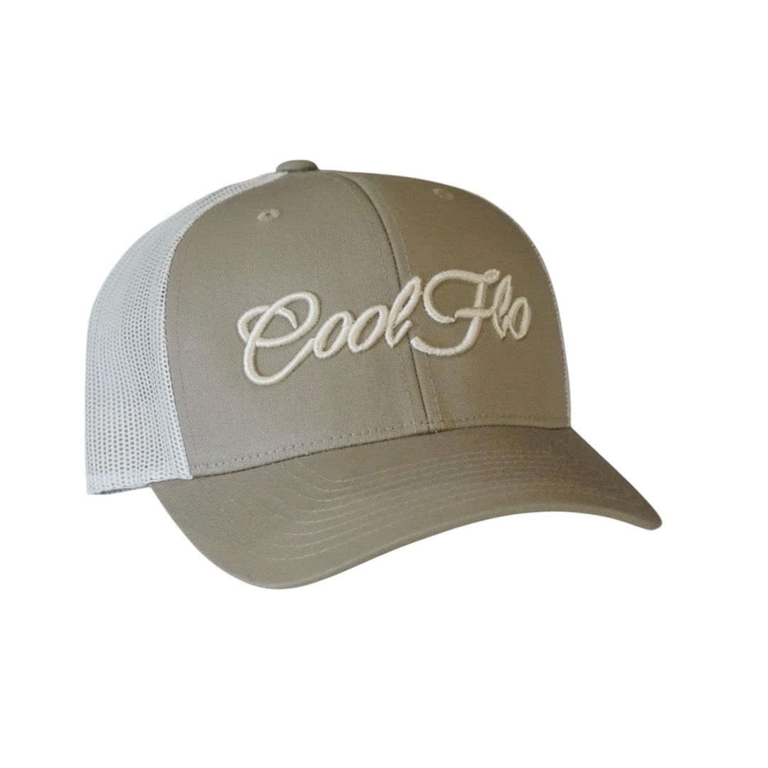 Two tone trucker cap in pale khaki and birch with matching 3D logo embroidered on the front. 