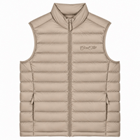 Cool Flo Puffer Gilet in desert dust with tonal embroidered Cool Flo Script logo, zippered pockets and quilted finish.