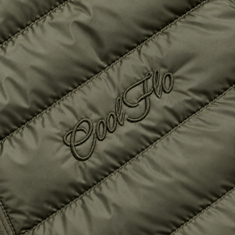 Close-up of tonal Cool Flo Script embroidery on a khaki quilted jacket.