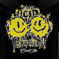 A close-up of a black t-shirt featuring a yellow and black 'smileys' graphic print on the front with the text 'THE ACID BROTHERS' and  a 'Cool Flo' script logo.