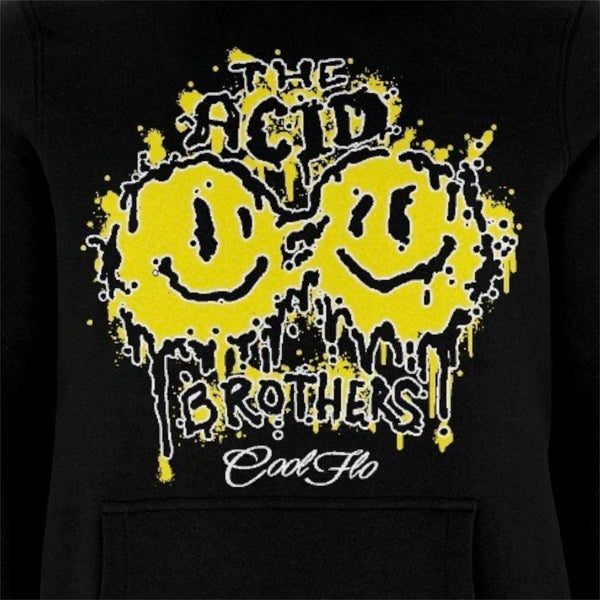 A close-up of a black pullover hoody featuring a yellow and black 'smileys' graphic print on the front with the text 'THE ACID BROTHERS' and  a 'Cool Flo' script logo.