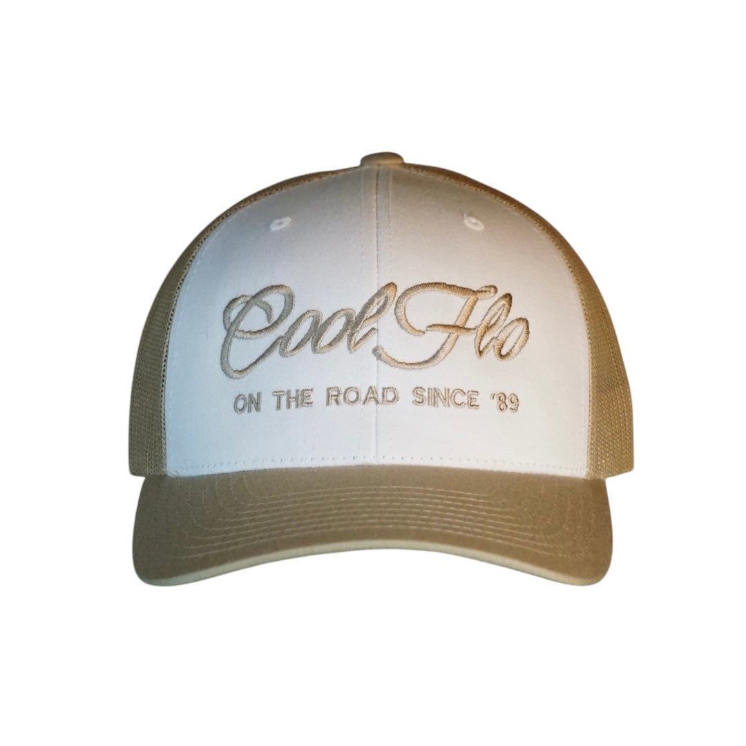 Cool Flo khaki and white trucker cap with khaki embroidered logo and 'On the road since '89' design.