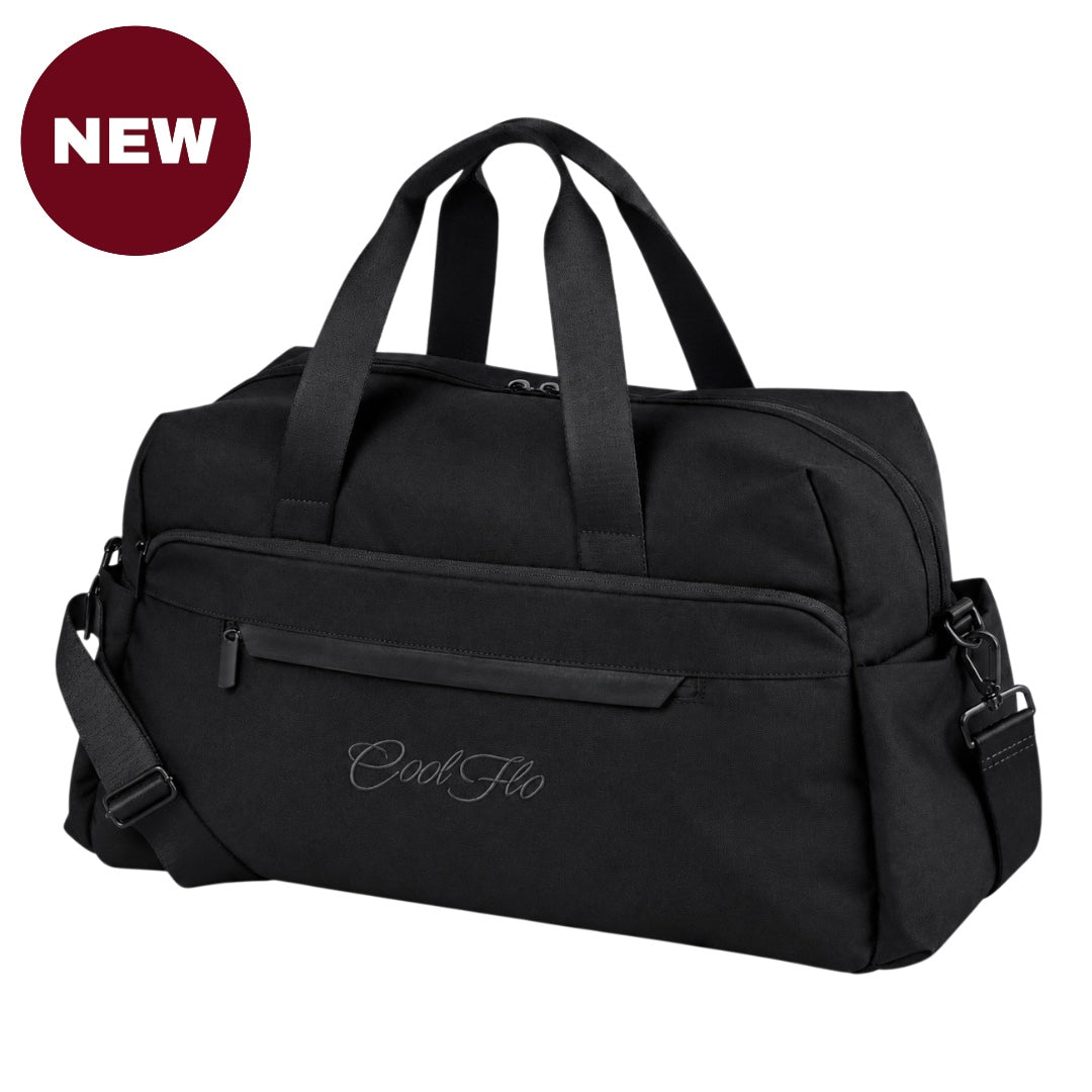 'NEW' Black weekender bag with dual top handles, a front zippered pocket, and a detachable shoulder strap, featuring the script brand name 'Cool Flo' embroidered on the front, set against a plain white background.