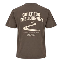 Back view of Cool Flo mocha t-shirt, featuring a cream graphic print with the text 'BUILT FOR THE JOURNEY', a winding road illustration, followed by 'IT'S ALL ABOUT THE RIDE' strapline and a Cool Flo script logo.