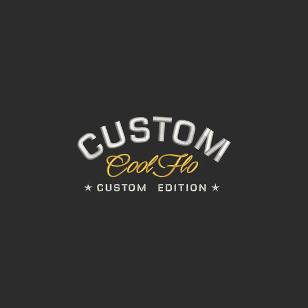 Close-up of Cool Flo Custom Edition black base with silver and yellow embroidery.