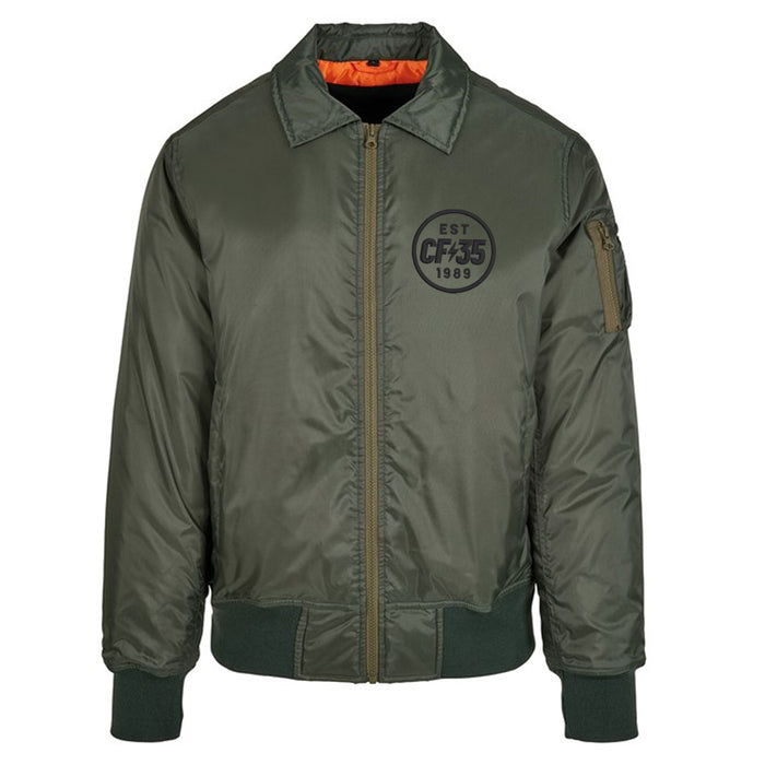 CF35 Green bomber jacket with black embroidered CF35 logo on left and contrast orange lining.