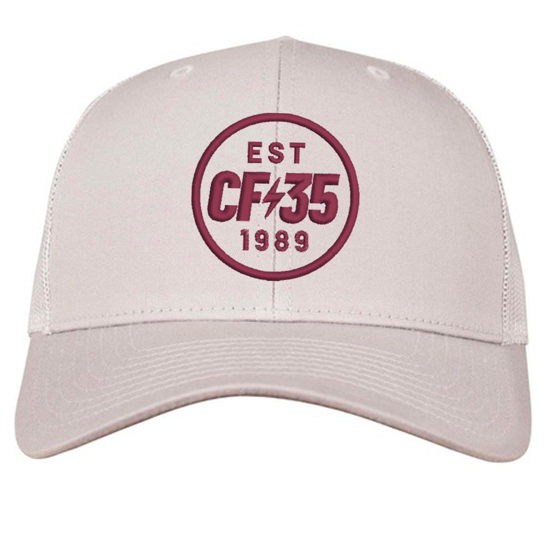 CF35 silver trucker cap with maroon CF35 embroidered logo.