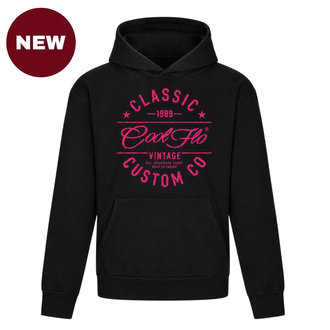 Cool Flo Classic Custom Co black hoody with bold white fuschia pink graphic design. A deep red 'NEW' in the top left hand corner of the image.