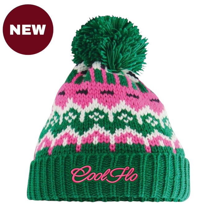 A green, pink, and white knit pom-pom beanie with a ribbed cuff and the brand name 'CoolHo' embroidered in pink on the front. A dark red circular 'NEW' badge is in the top-left corner, set against a plain white background.