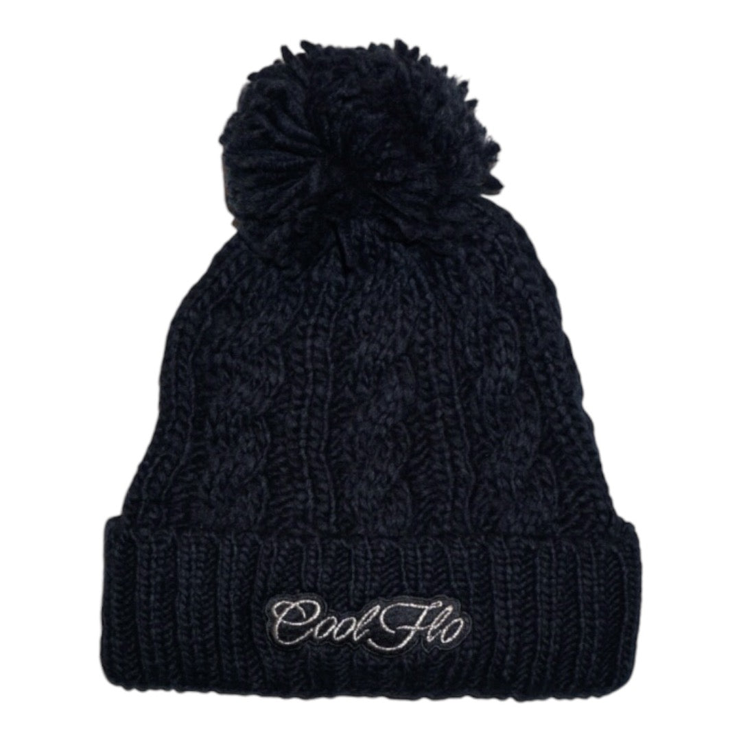 Cable knit beanie with script logo in navy blue.