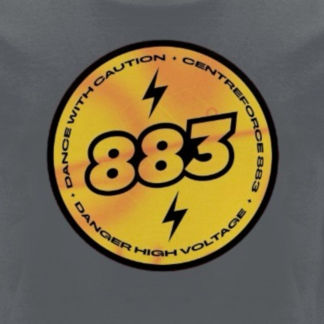 Close-up design image: Centreforce radio anthracite grey t-shirt featuring a large yellow and black ‘High Voltage’ logo print on the front.