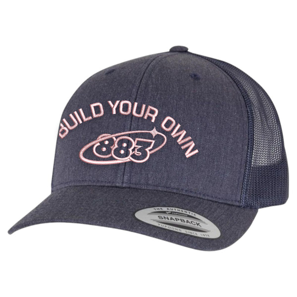 Centreforce 883 custom trucker in heather blue, with pink 'build your own' embroidery and 883 Orbit logo - side view