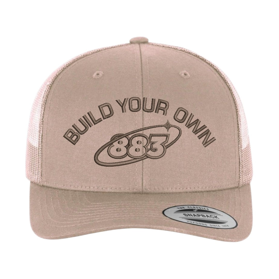 Centreforce 883 custom trucker in khaki, with matching brown 'build your own' embroidery and 883 Orbit logo - front view
