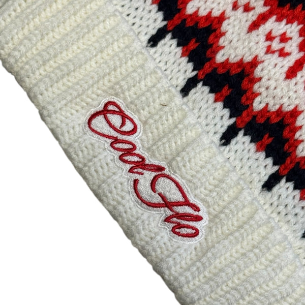 Close-up of Cool Flo Polar Fade Ski Beanie in a navy, red and white colour way with matching red and white embroidered logo.