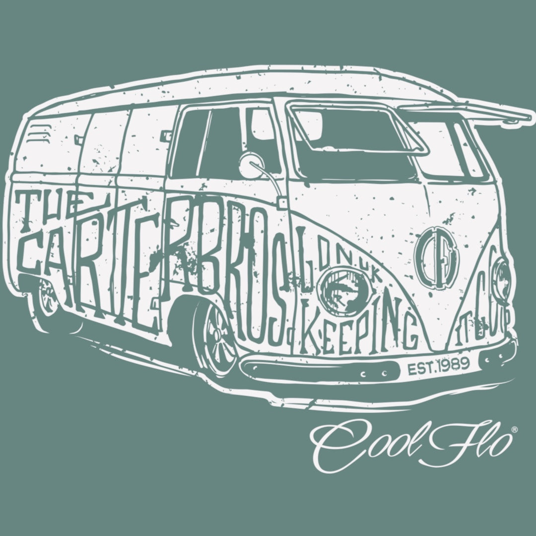 Close-up of the Carter Brothers vintage camper graphic printed in cream on green tee.