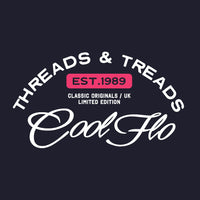 Close up of Threads & Treads print in pink and white on a navy blue t-shirt.