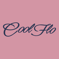 Close up of the Cool Flo Script Logo in navy blue on a pink t-shirt.
