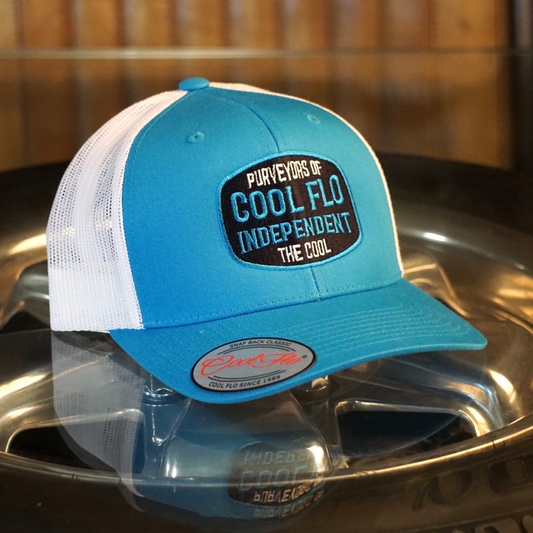 Cool Flo  Independent Turquoise and white trucker cap with embroidered badge design in complimentary colours.