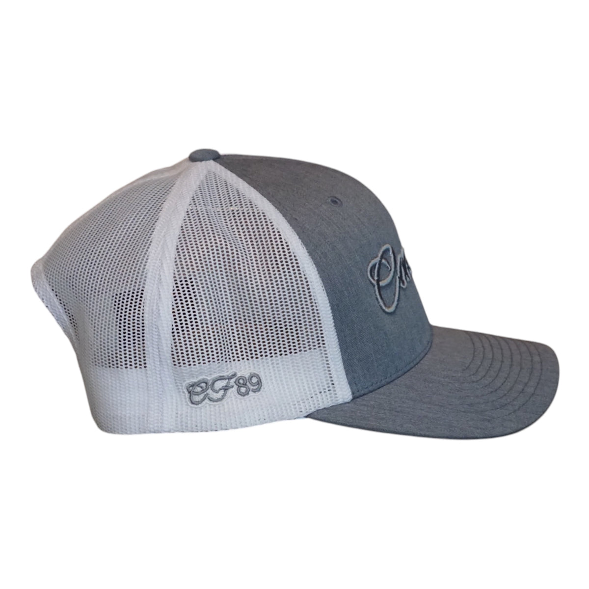 A heather grey trucker cap with white mesh side panels, and grey embroidered 'Cool Flo' Script logo embroidered across the front and CF89 embroidered on the side.