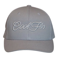 Front view of a Cool Flo silver-grey trucker cap featuring a raised 3D embroidered Script logo in tonal silver-grey and a curved visor
