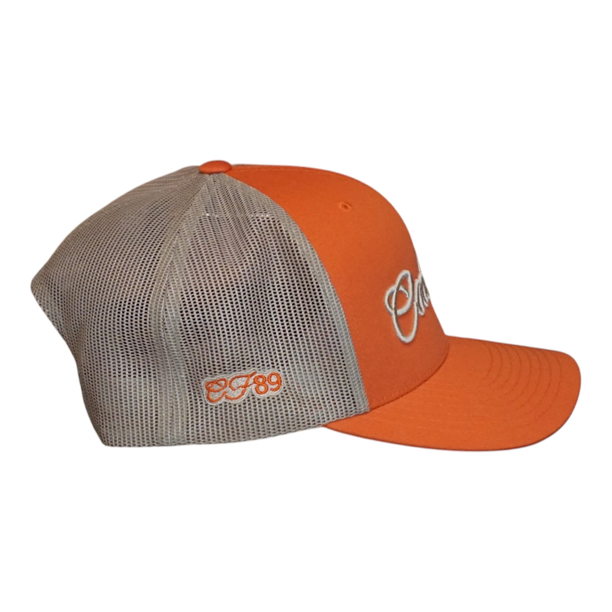 An orange and khaki trucker featuring a golden embroidered Cool Flo Script logo on the front and 'CF89' embroidered on the side mesh in orange.