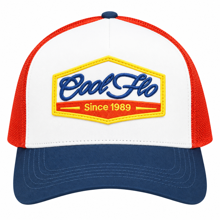 Front view of a Cool Flo Since 1989 trucker cap in White/Blue/Red featuring an embroidered Since 1989 badge in Blue, Yellow and White and a curved visor.