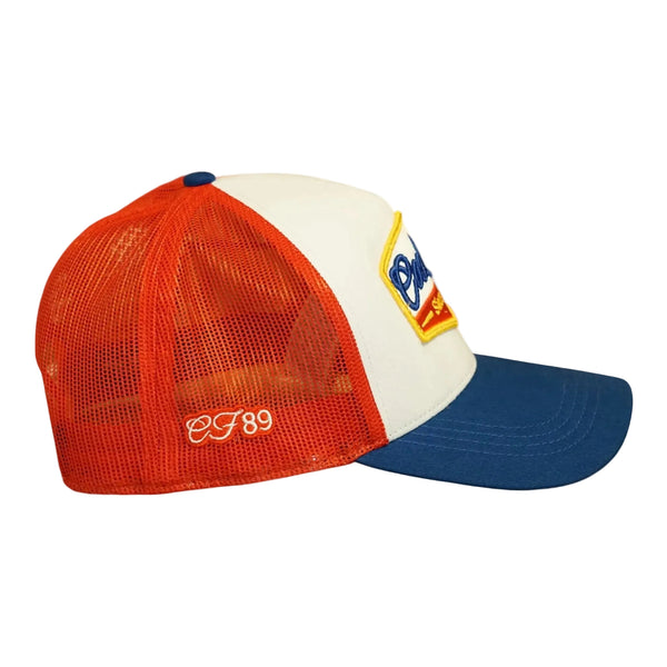 Right side view of a Cool Flo White/Red/Blue Since 1989 trucker cap featuring CF89 embroidered side detail, breathable mesh back panels and adjustable snapback fastening