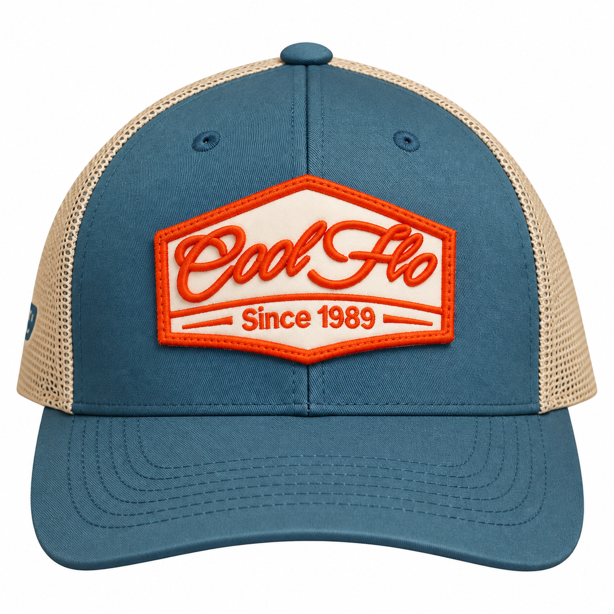 Front view of a Cool Flo Since 1989 trucker cap in Blue/Silver featuring an embroidered Since 1989 badge in Orange and White and a curved visor.