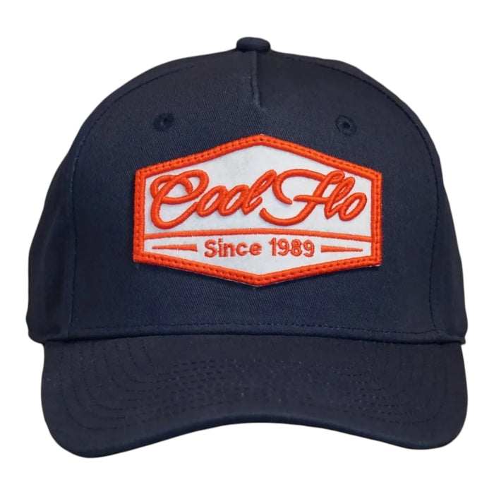 Front view of a Cool Flo Since 1989 baseball cap in Navy featuring an embroidered Since 1989 badge in Orange and White and a curved visor