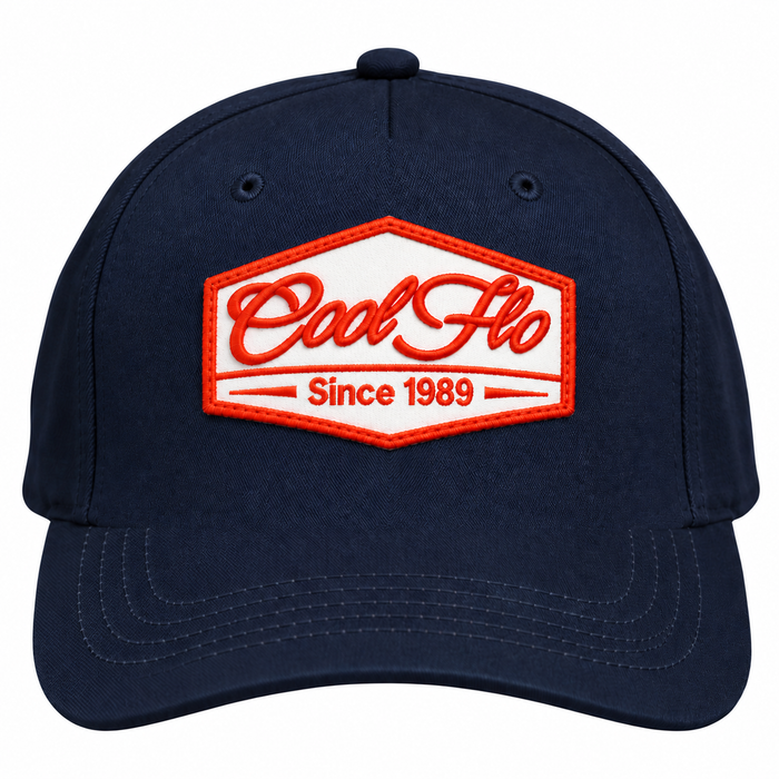 Front view of a Cool Flo Since 1989 baseball cap in Navy featuring an embroidered Since 1989 badge in Orange and White and a curved visor.