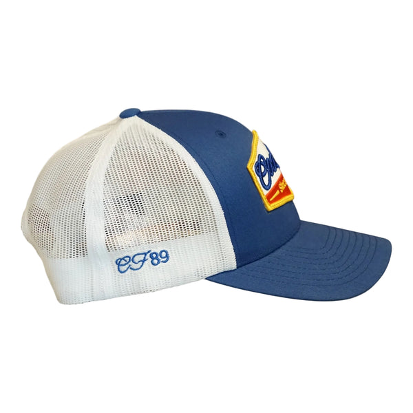 Right side view of a Cool Flo Blue/White Cool Flo Since 1989 trucker cap featuring CF89 embroidered side detail, breathable mesh back panels and adjustable snapback fastening